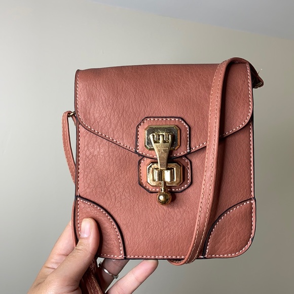 J Francis Handbags - J Francis blush accordion style crossbody bag